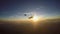 Skydivers having fun at the amazing sunset 4K video