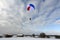 Skydiving. A circle color parachute is landing.