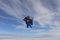 Skydiving. Tandem jump. Two people are in the sky.