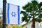 Skyline cityscape with national Israeli flag Tel Aviv Israel
