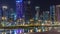 The skyline of Doha by night with starry sky seen from Park timelapse, Qatar