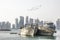 Skyline of Doha with traditional arabic dhows