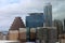 Skyline filled with old and new buildings, stormy skies overhead, Austin, Texas, 2018