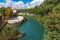 Skyline landscape of beautiful Roma from the Tiber shore in a clear blue sky and sunny day. Famous tourist destination in Italy