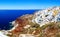 Skyline of Oia, traditional white architecture with windmills, greek village of Santorini, Greece. Santorini is island