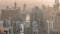 Skyline panoramic view of Dubai Marina showing an artificial canal surrounded by skyscrapers along shoreline timelapse