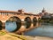 Skyline of Pavia, with bridge over the river Ticino