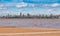 Skyline of Posadas in Argentina, photographed from the beach in Encarnacion.