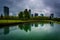 The skyline reflecting in a pond, at Downtown Park, in Bellevue, Washington.