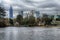 Skyline and reflections of midtown Atlanta, Georgia in Lake Meer from Piedmont Park.