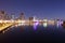 Skyline of Sharjah City at dusk