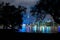 the skyline of toronto lit up at night, with the river below it