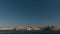 Skyline of Valletta, Malta under blue sky, with dome of Basilica of Our Lady of Mount Carmel and tower of St Paul`s Pro-Cathedral