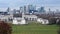 Skyline view of the City of London, the conservatoire and the Thames, across Greenwich Par.