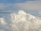 Skyscape - blue sky and thick white clouds; clouds texture