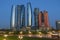 Skyscrapers of Abu Dhabi at night with Etihad Towers buildings. Abu Dhabi is the capital and the second most populous city of the