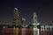 Skyscrapers at evening near water, The Building near the river.