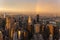 Skyscrapers at midtown New York City with the East River on the background at dramatic after the storm sunset light.