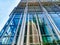 Skyscrapers are reflected in the glass facade of another skyscraper in Hong Kong China