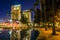 Skyscrapers reflecting in the Children\'s Pond at night, in San D