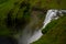 SkÃ³gafoss tourist popular waterfall, Iceland