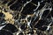 A slab of black expensive marble with yellow and white veins is called New Portoro