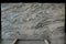 A slab of natural stone of gray-white color with a beautiful pattern is called Arabescato Orobico Grigio marble