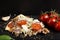 Slace of kebap pizza made with minced meat, cabbage, tomato and