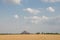 Slagheap in western Ukraine with wheat field