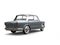 Slate gray small compact vintage car - back view