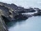 SLATE ROCKS FALLING INTO SEA IN WEST WALES, UK
