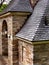 Slate roof with stone wall