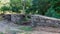 Slate and stone bridge over dry river