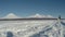 Sled dog racing on background of Kamchatka volcanoes