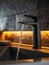Sleek Black Faucet with Flowing Water in Luxurious Bathroom. Generative ai