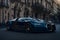 Sleek bugatti veyron supercar in a bustling cityscape with traditional architecture generative by AI