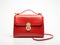 Sleek and Chic: Unveiling the Stunning Red Leather Bag with a Unique Metal Clasp