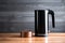 sleek electric kettle set on a wooden countertop