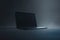 Sleek Modern Laptop on Dark Background with Dramatic Lighting