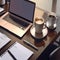 Sleek Modern Workspace with Laptop, Coffee Cup, and Office Supplies