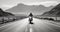 a sleek motorbike cruising down an empty, sunlit highway. The rider leans forward, fully immersed in the thrill of their