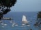 A sleek schooner under sail in admiralty bay