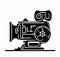 A sleek silhouette of a handheld cinema camera