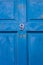 Sleek, simple & beautiful blue wooden front door with the house number 9