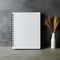 Sleek simplicity White notebook on a cool, gray concrete background