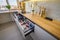 A sleek white kitchen with drawers extended