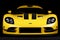 Sleek Yellow Sports Car on a Dark Background