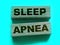 Sleep apnea words on wooden blocks. Sleep disorders healthcare concept