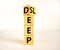 Sleep deep symbol. Turned a wooden cube with words Sleep deep. Beautiful white table white background, copy space. Healthy