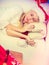 Sleeping blonde woman in santa hat